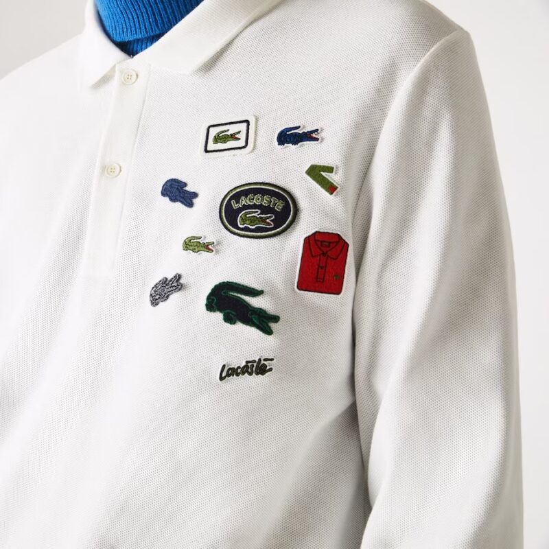 Polo Lacoste en algodón de corte regular con insignias para hombre