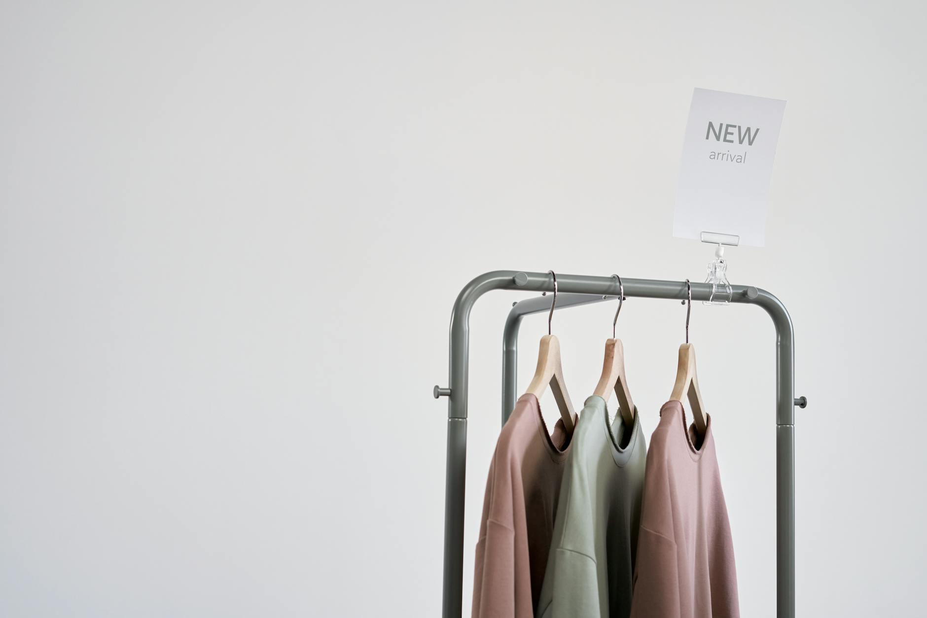 newly arrived shirts on a clothing rack